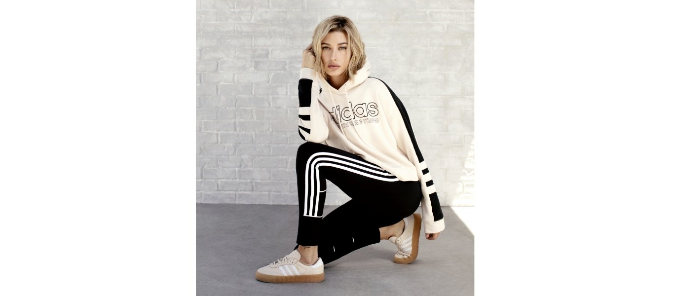 hailey baldwin crouched adidas
