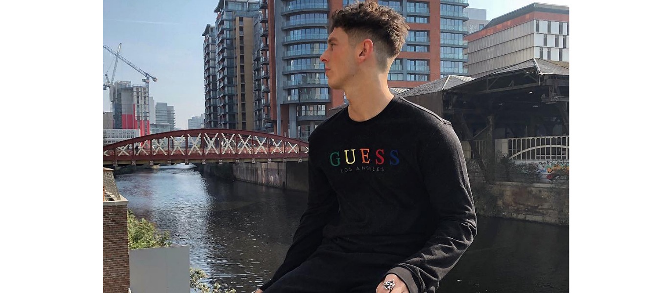 influencer in guess sweatshirt